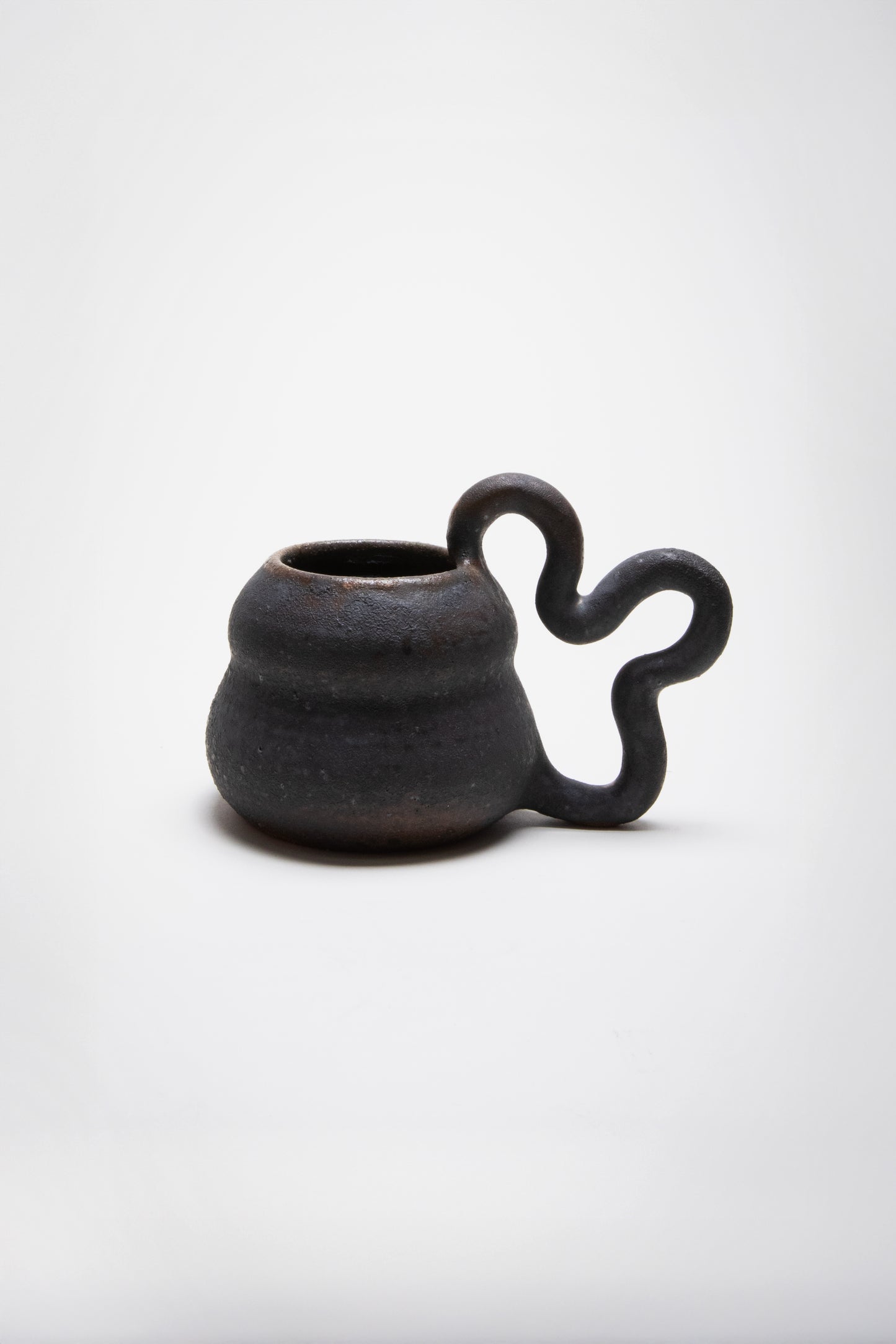 Black Mug by Jane Kang