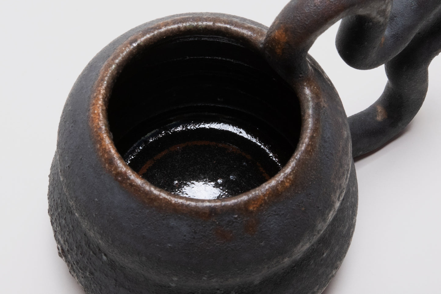 Black Mug by Jane Kang